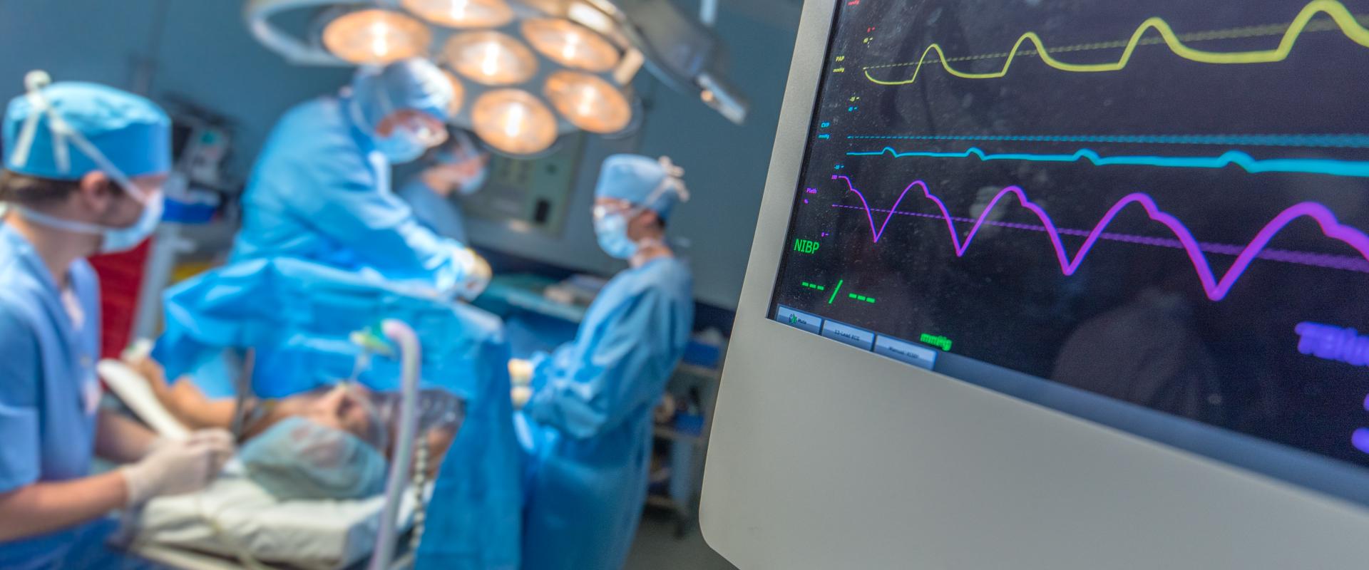 Doctors performing heart operation